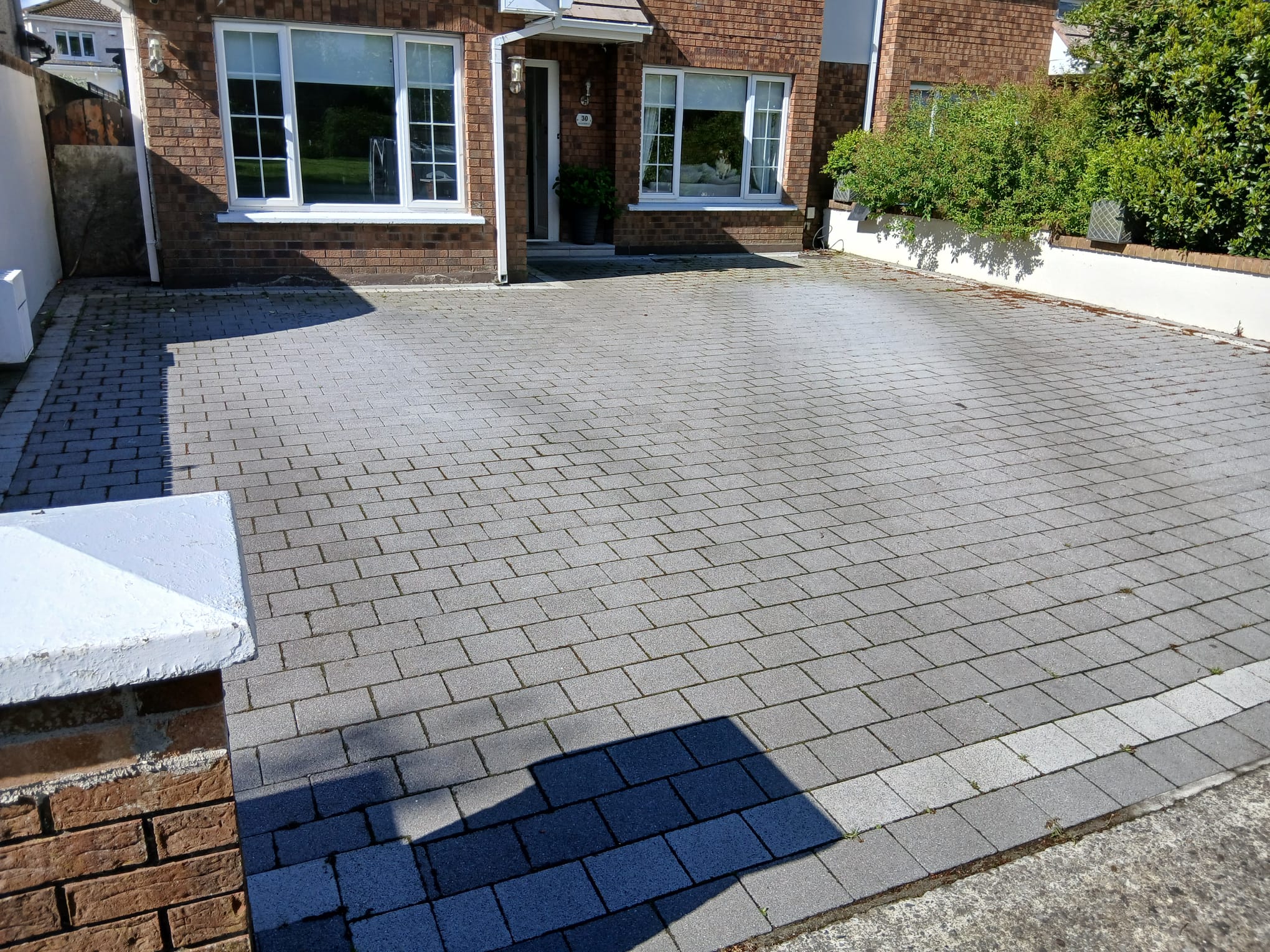 Driveway before professional cleaning process