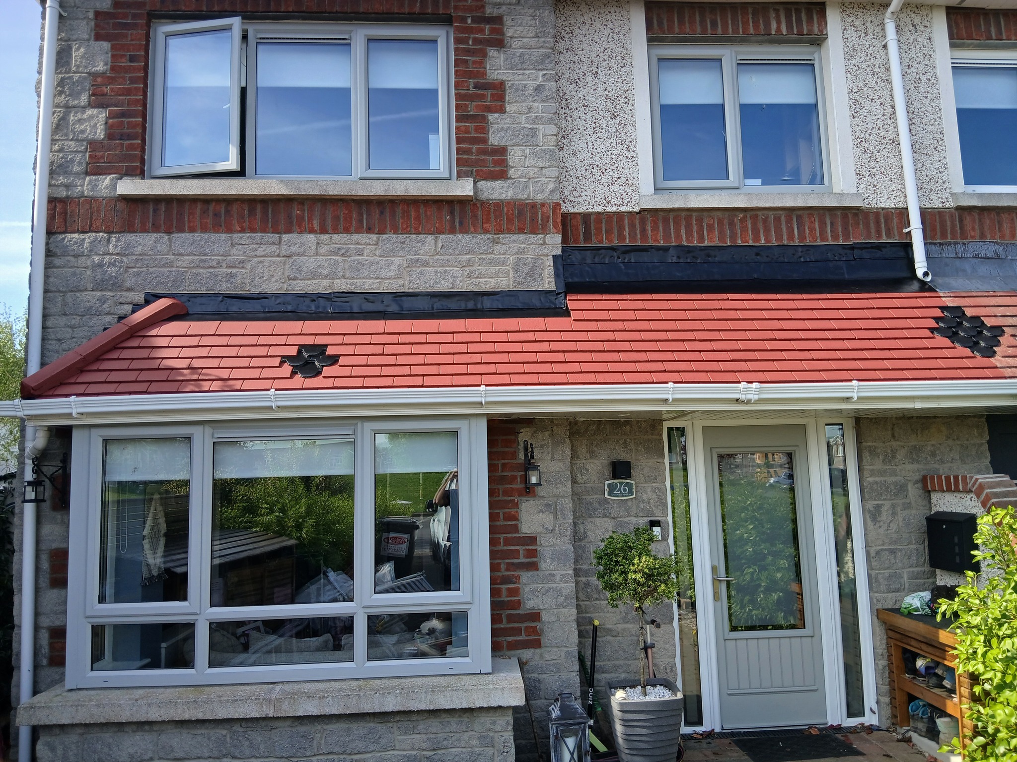 Clean roof after soft washing treatment